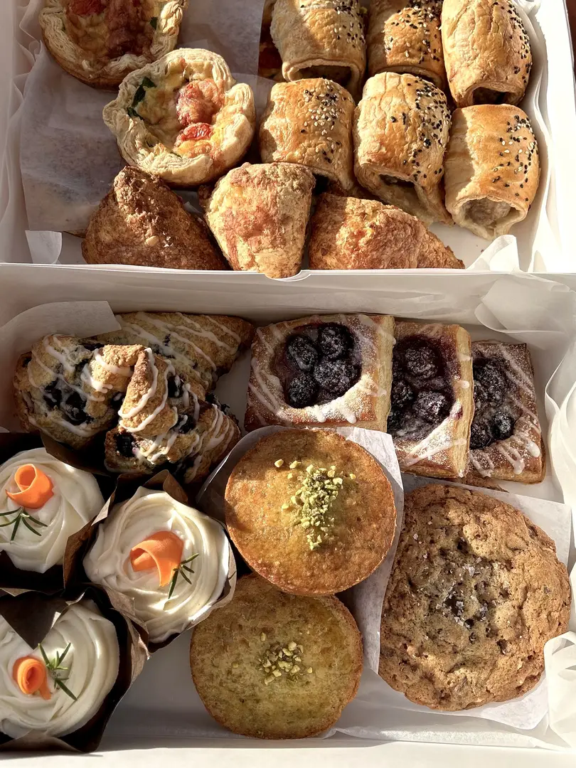 Assorted bakery pastries and desserts.