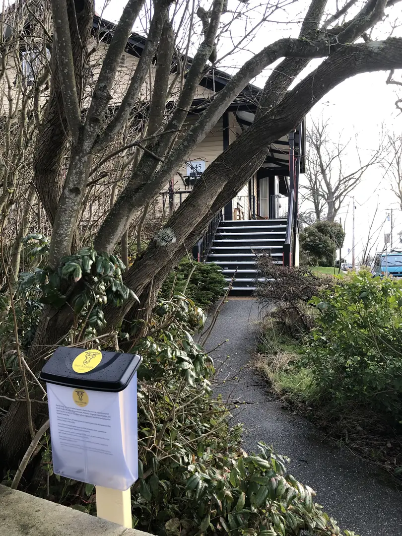House with a free books box outside.