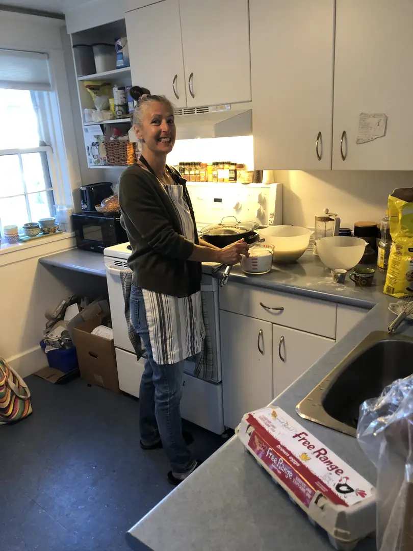 Woman cooking in a home kitchen.